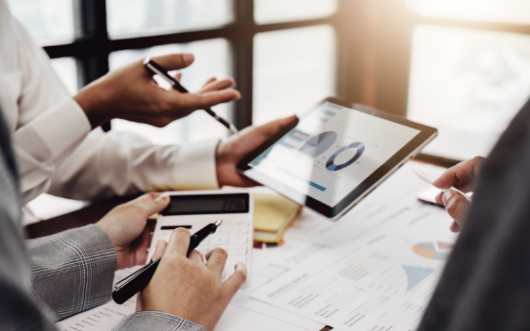 strategic planning team calculating tuition costs for k through twelve schools